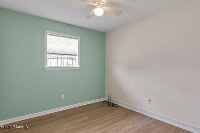164 Mimosa Pl, Lafayette, LA 70506 - spare room featuring wood finished floors, baseboards, and ceiling fan