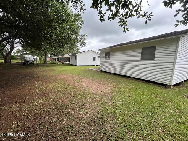 143 Monette St, Ville Platte, LA 70586 - view of green lawn