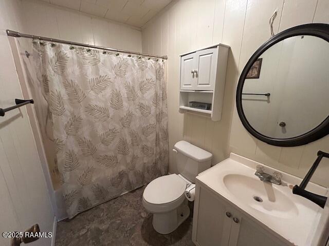 143 Monette St, Ville Platte, LA 70586 - full bathroom featuring toilet, vanity, and shower / tub combo with curtain