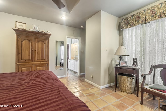 10154 Willow Crest Rd, Abbeville, LA 70510 - bedroom featuring baseboards, ensuite bathroom, recessed lighting, and light tile patterned flooring