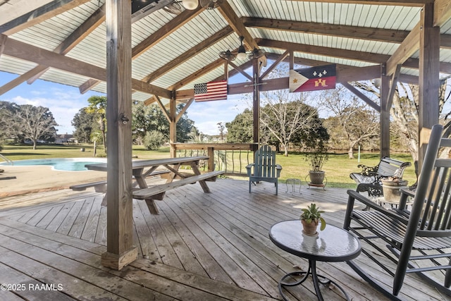10154 Willow Crest Rd, Abbeville, LA 70510 - wooden terrace featuring a yard, a gazebo, and ceiling fan