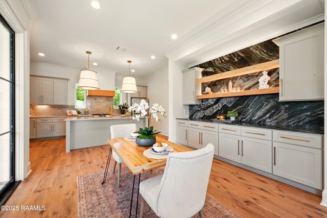 108 Meadowbrook Dr, Broussard, LA 70518 - dining space with crown molding, light wood-type flooring, and recessed lighting