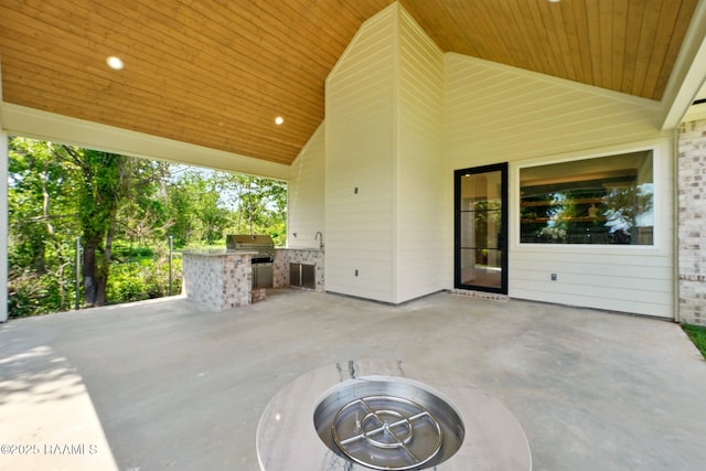 108 Meadowbrook Dr, Broussard, LA 70518 - view of patio featuring an outdoor kitchen, grilling area, and an outdoor fire pit