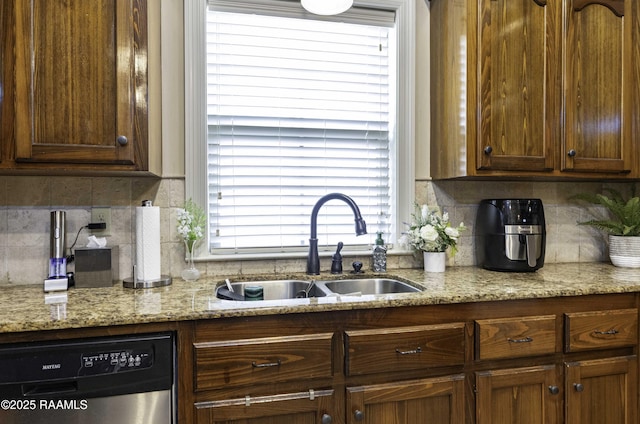 100 Mirada Ln, Lafayette, LA 70508 - kitchen with dishwasher, a sink, tasteful backsplash, and light stone counters