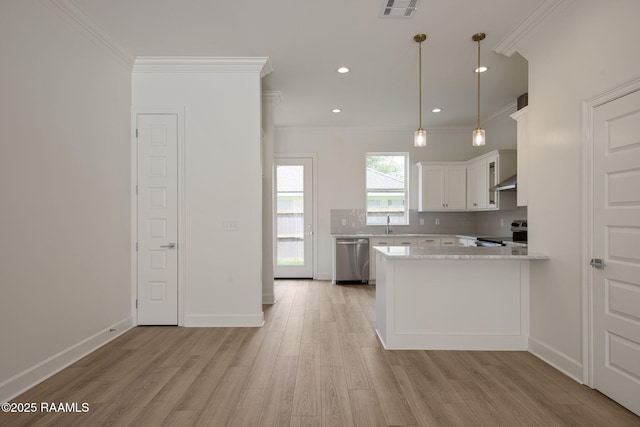 1510 Kaliste Saloom Unit 101, Lafayette, LA 70508 - kitchen with appliances with stainless steel finishes, ornamental molding, light wood-style floors, a peninsula, and white cabinets