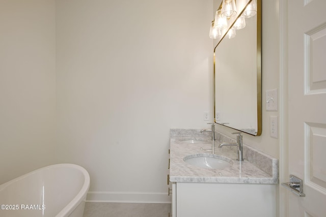 1510 Kaliste Saloom Unit 101, Lafayette, LA 70508 - bathroom featuring double vanity, a soaking tub, and baseboards
