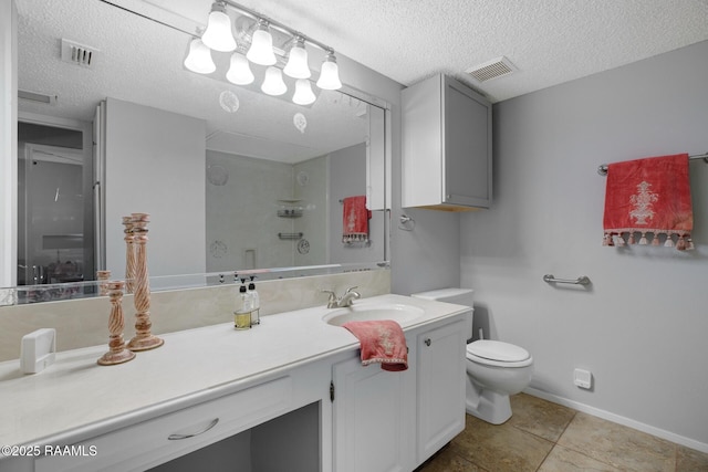 1304 E Bayou Pkwy Unit 4A, Lafayette, LA 70508 - full bathroom featuring a textured ceiling, vanity, toilet, a shower, and baseboards