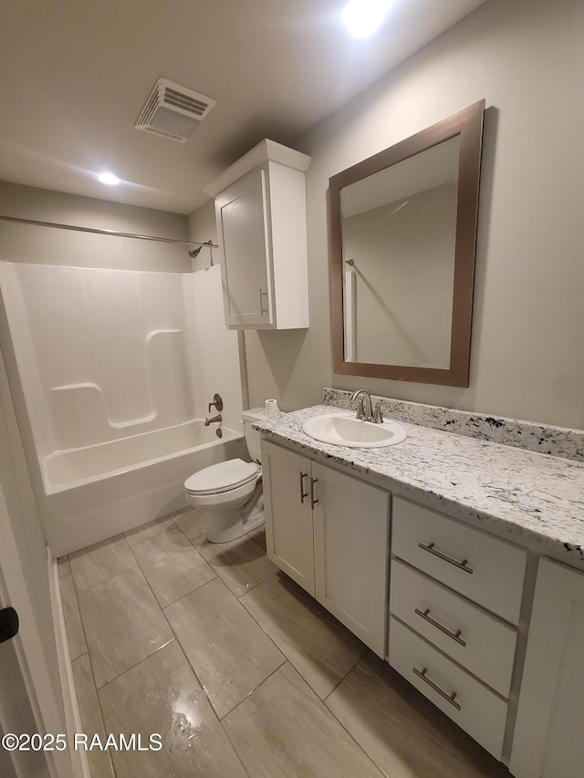 313 Harvest Ln, Abbeville, LA 70510 - bathroom with toilet, vanity, and shower / washtub combination