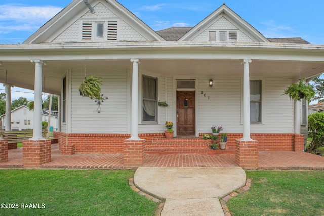 307 N Market St, Opelousas, LA 70570 - view of front of property featuring a porch