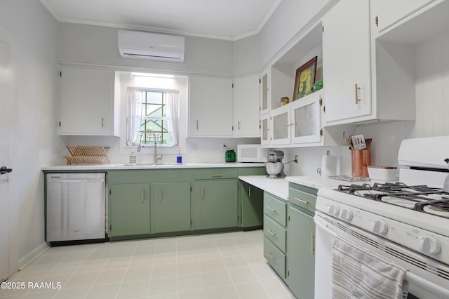 307 N Market St, Opelousas, LA 70570 - kitchen with white appliances, a sink, a wall mounted AC, green cabinets, and light countertops