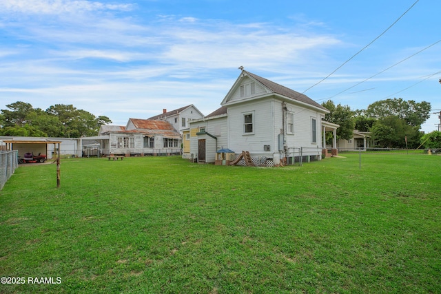 307 N Market St, Opelousas, LA 70570 - rear view of property with an outdoor structure