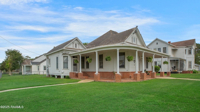 307 N Market St, Opelousas, LA 70570 - view of front of house featuring a porch and a shingled roof