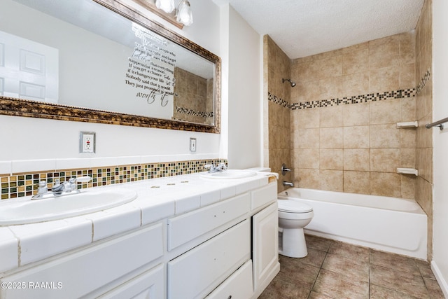 421 Plantation Rd, Opelousas, LA 70570 - full bathroom featuring toilet, double vanity, backsplash,  shower combination, and a textured ceiling