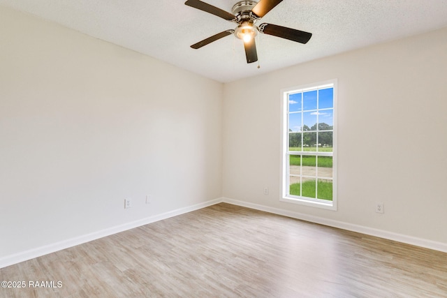 421 Plantation Rd, Opelousas, LA 70570 - unfurnished room featuring wood finished floors, ceiling fan, and baseboards