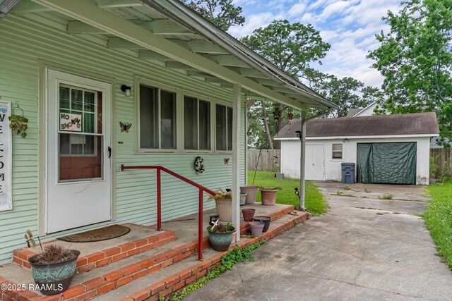 423 E 1st St, Jennings, LA 70546 - view of patio with an outdoor structure