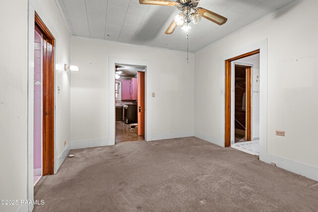 423 E 1st St, Jennings, LA 70546 - unfurnished bedroom featuring carpet floors, crown molding, and baseboards