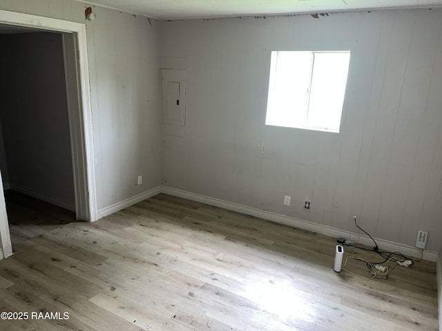 113 Fred St, Lafayette, LA 70501 - empty room with light wood-style flooring, electric panel, and baseboards