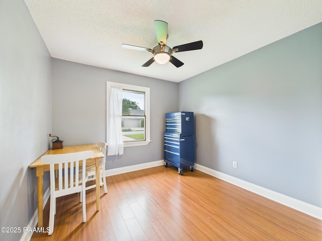 304 Bull Run Cir, Broussard, LA 70518 - bedroom with wood finished floors, a textured ceiling, and ceiling fan
