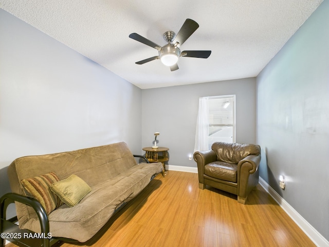 304 Bull Run Cir, Broussard, LA 70518 - sitting room featuring light wood finished floors, a ceiling fan, and a textured ceiling