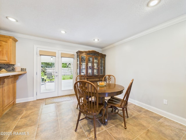 304 Bull Run Cir, Broussard, LA 70518 - dining space featuring french doors, ornamental molding, light tile patterned floors, and recessed lighting