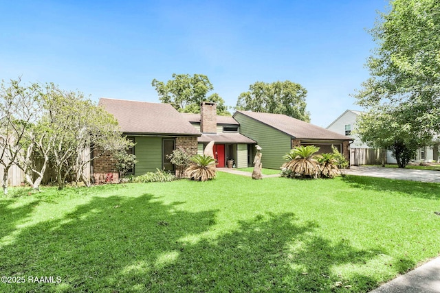 146 Steiner Rd, Lafayette, LA 70508 - mid-century home featuring a chimney, concrete driveway, a garage, brick siding, and a shingled roof