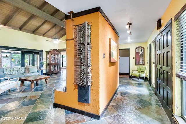 146 Steiner Rd, Lafayette, LA 70508 - hall with stone tile flooring, baseboards, and wooden ceiling