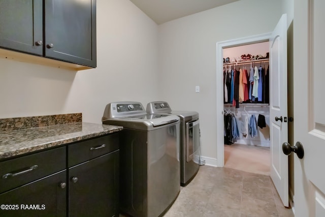 123 Angel Rock Ln, Broussard, LA 70518 - washroom featuring cabinet space, separate washer and dryer, and baseboards