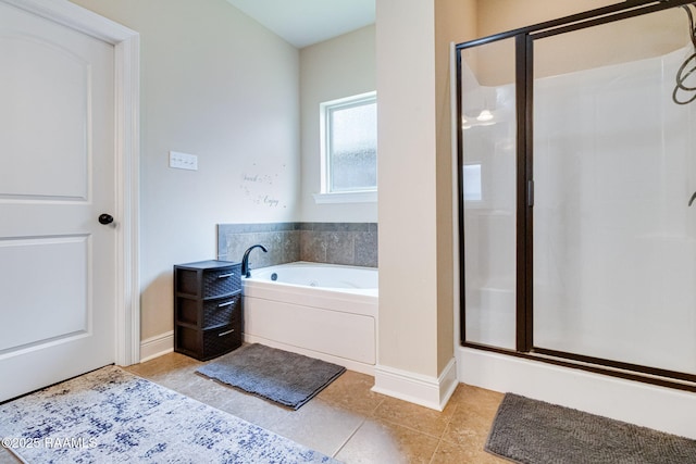 123 Angel Rock Ln, Broussard, LA 70518 - bathroom with a stall shower, a garden tub, baseboards, and tile patterned floors
