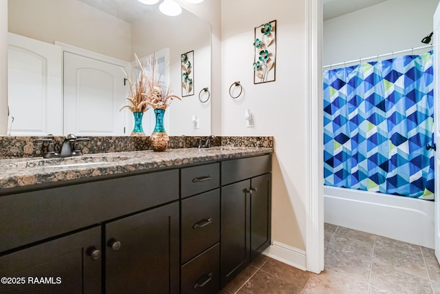 123 Angel Rock Ln, Broussard, LA 70518 - full bathroom with double vanity, shower / tub combo with curtain, and baseboards