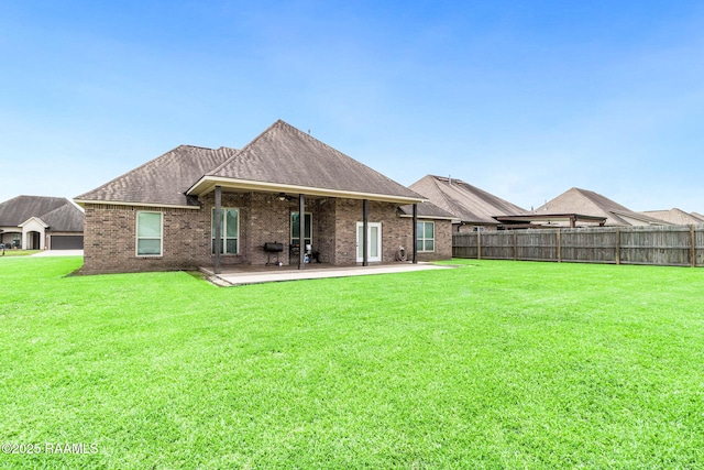 123 Angel Rock Ln, Broussard, LA 70518 - back of property featuring a patio area, brick siding, a shingled roof, and a ceiling fan
