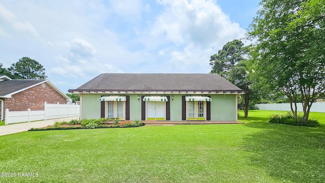 113 Jeanne St, Eunice, LA 70535 - view of front of property featuring a shingled roof, stucco siding, and driveway