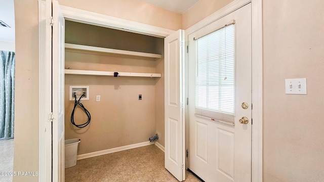 113 Jeanne St, Eunice, LA 70535 - washroom featuring washer hookup, electric dryer hookup, and baseboards