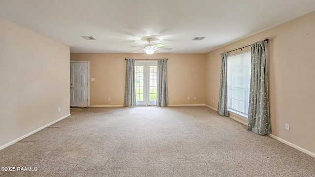 113 Jeanne St, Eunice, LA 70535 - spare room with ceiling fan, carpet floors, and baseboards