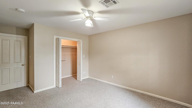 113 Jeanne St, Eunice, LA 70535 - unfurnished bedroom featuring light carpet, baseboards, a closet, and ceiling fan