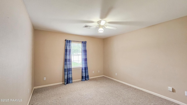 113 Jeanne St, Eunice, LA 70535 - unfurnished room featuring a ceiling fan, light colored carpet, and baseboards