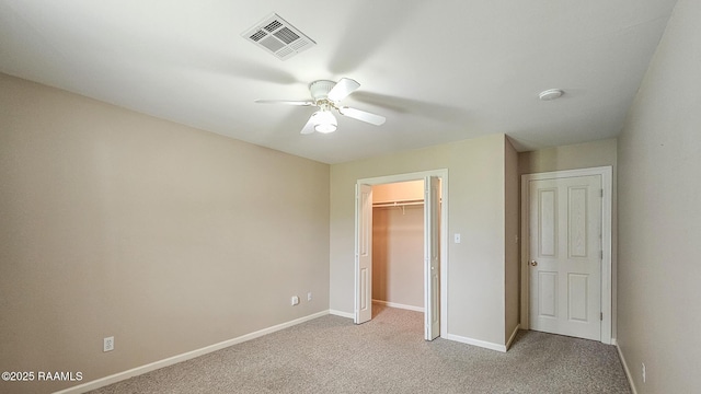 113 Jeanne St, Eunice, LA 70535 - unfurnished bedroom featuring light carpet, baseboards, a closet, and ceiling fan