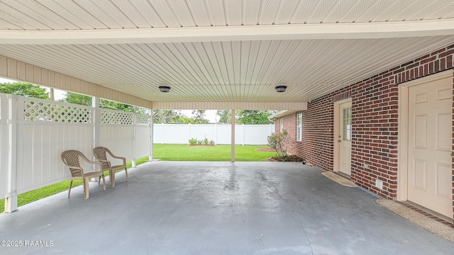 113 Jeanne St, Eunice, LA 70535 - view of patio / terrace featuring a carport