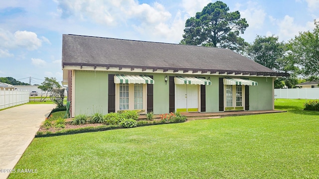 113 Jeanne St, Eunice, LA 70535 - view of front of property featuring roof with shingles, concrete driveway, and stucco siding