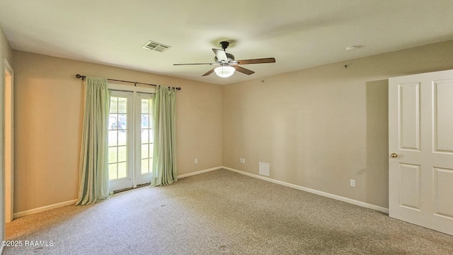 113 Jeanne St, Eunice, LA 70535 - spare room with a ceiling fan, carpet flooring, and baseboards
