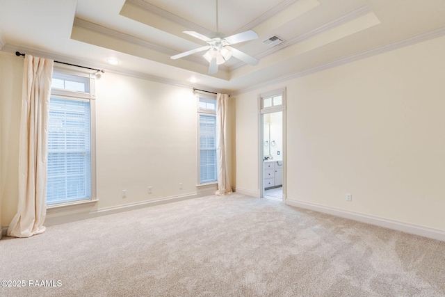 114 Briarmeadow Dr, Lafayette, LA 70508 - empty room with ornamental molding, a tray ceiling, light colored carpet, a ceiling fan, and baseboards