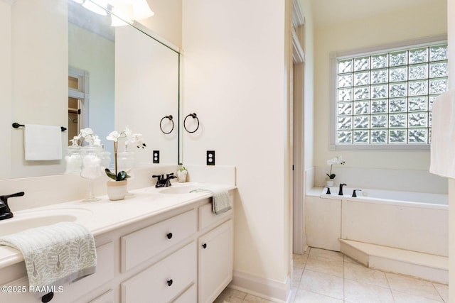 114 Briarmeadow Dr, Lafayette, LA 70508 - bathroom featuring double vanity, a bath, tile patterned floors, and baseboards