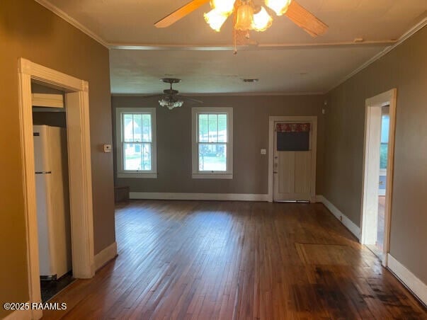 201 Allen St, New Iberia, LA 70563 - unfurnished living room with ornamental molding, wood finished floors, baseboards, and ceiling fan