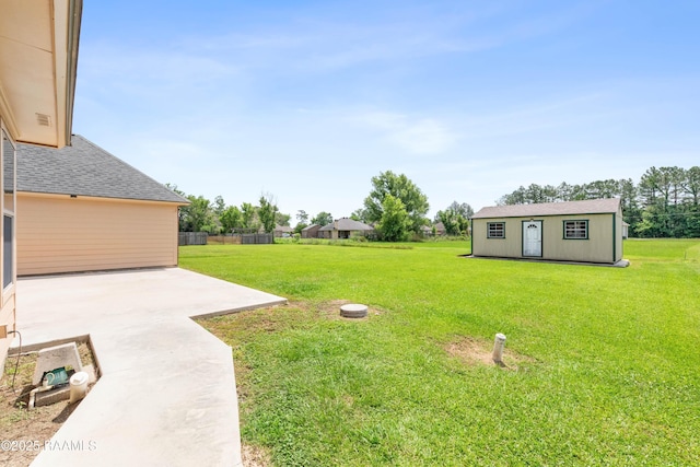 1117 Jules Broussard Rd, Breaux Bridge, LA 70517 - view of green lawn featuring a patio area and an outbuilding