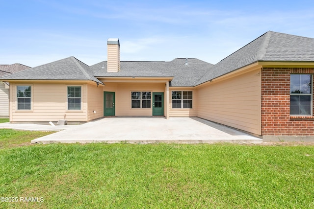 1117 Jules Broussard Rd, Breaux Bridge, LA 70517 - rear view of house featuring a patio area, a lawn, and a chimney
