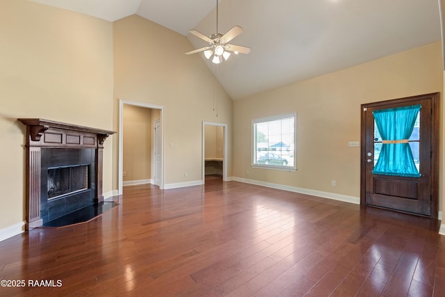 1117 Jules Broussard Rd, Breaux Bridge, LA 70517 - unfurnished living room featuring ceiling fan, high vaulted ceiling, a fireplace with flush hearth, wood finished floors, and baseboards