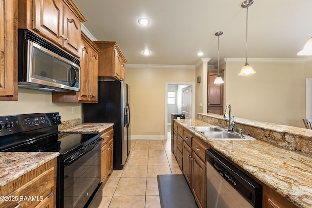 1117 Jules Broussard Rd, Breaux Bridge, LA 70517 - kitchen featuring stainless steel appliances, a sink, brown cabinetry, ornamental molding, and decorative light fixtures