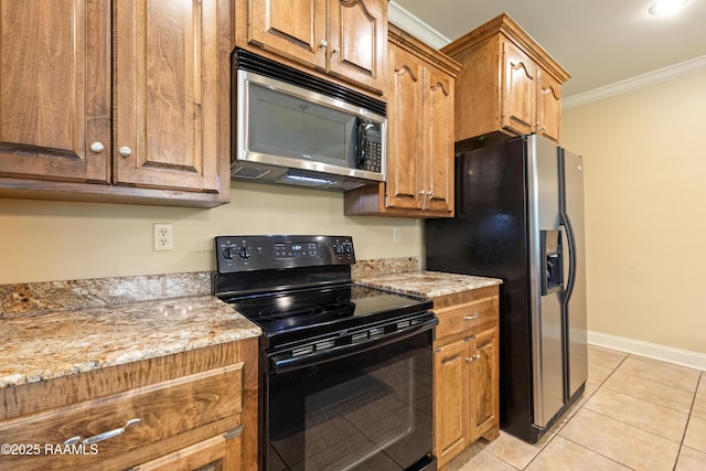 1117 Jules Broussard Rd, Breaux Bridge, LA 70517 - kitchen featuring stainless steel microwave, black electric range oven, refrigerator with ice dispenser, crown molding, and light tile patterned flooring