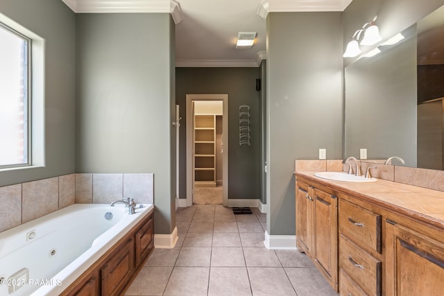 1117 Jules Broussard Rd, Breaux Bridge, LA 70517 - full bathroom featuring vanity, a tub with jets, ornamental molding, tile patterned floors, and baseboards