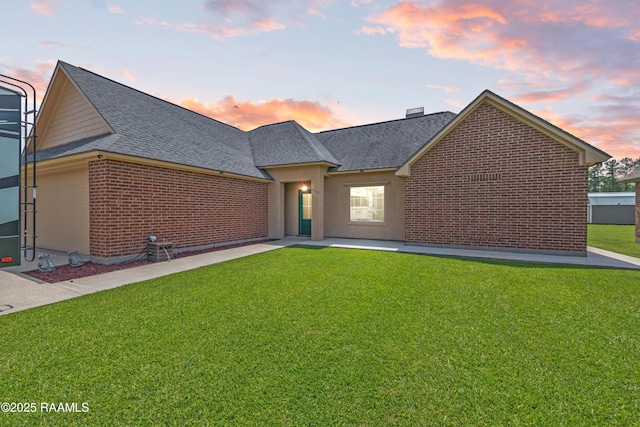 1117 Jules Broussard Rd, Breaux Bridge, LA 70517 - view of front facade with a front lawn, roof with shingles, and brick siding