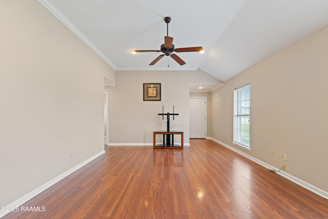 320 Golden Grain, Duson, LA 70529 - unfurnished living room featuring wood finished floors, a ceiling fan, ornamental molding, baseboards, and vaulted ceiling